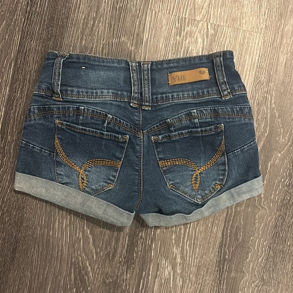 YMI Booty jean shorts. No real holes and pockets front and back. 3 buttons. - Picture 2 of 4